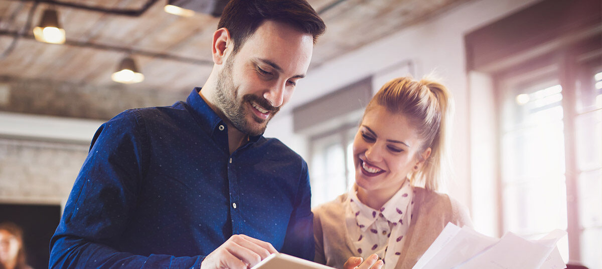 Office workers discussing strategies for Business Loss Preparedness