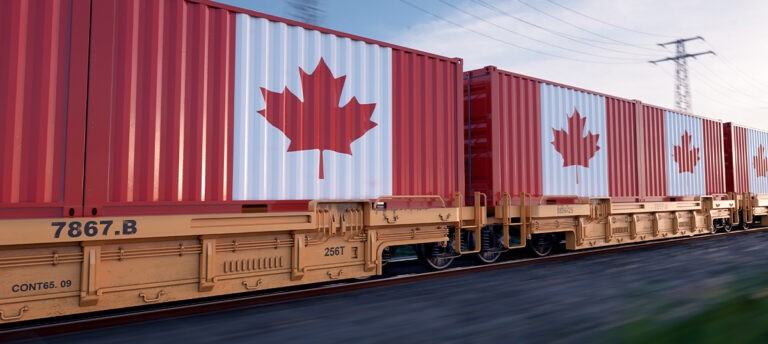 Running train loaded with containers with the flag of Canada.