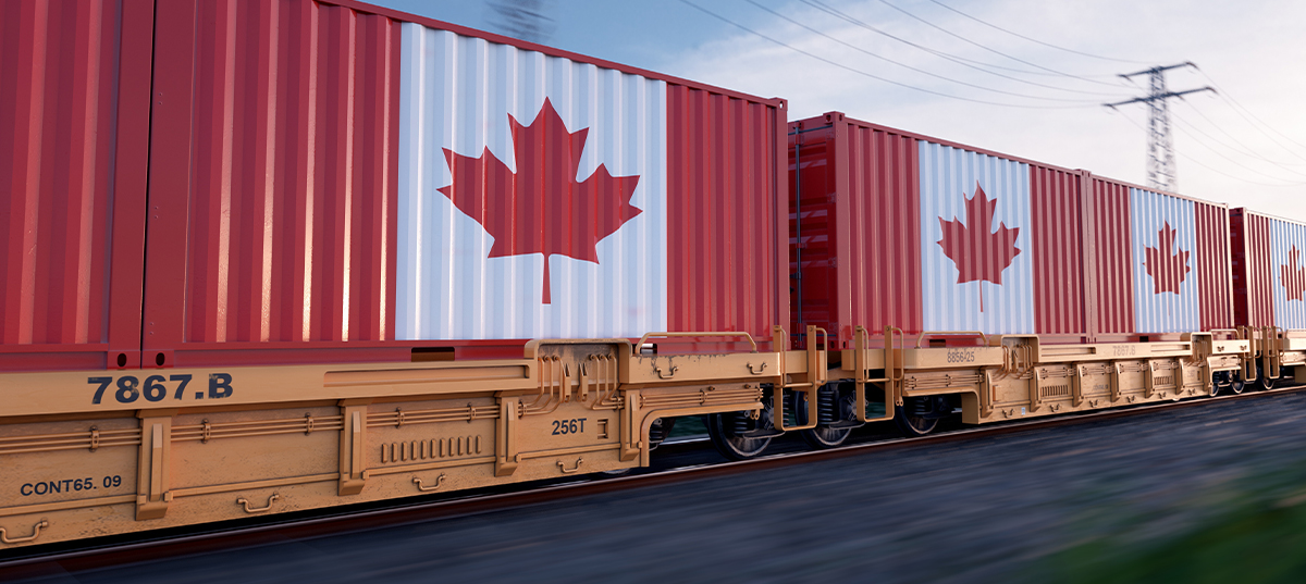 Running train loaded with containers with the flag of Canada.